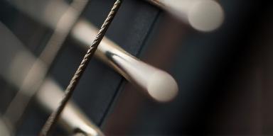 Close up of guitar strings